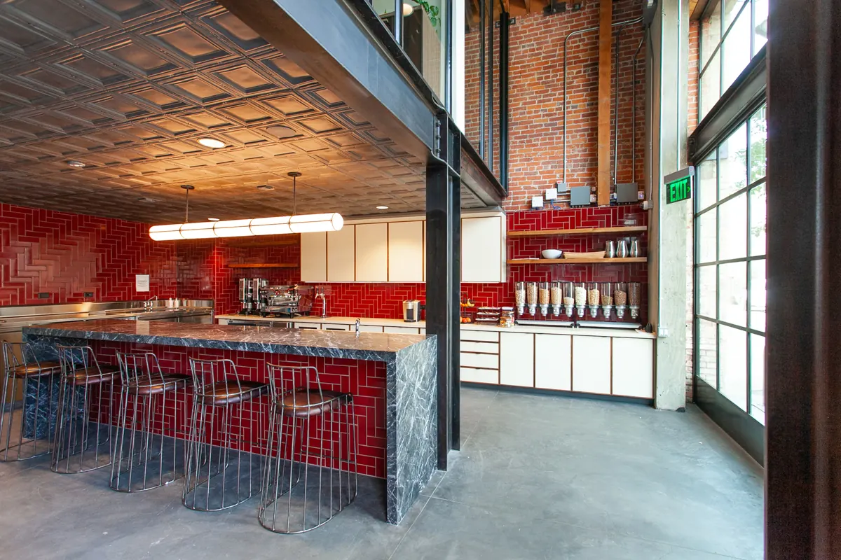 Custom commercial break room cabinetry and millwork built by California Woodworking